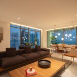 Image of the living area with a couch, table and chairs at Sea Point