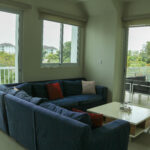 Image of living area with a couch and table at Cocoli