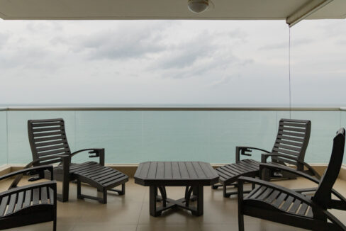 Balcony with ocean views in this condo for sale in Biltmore